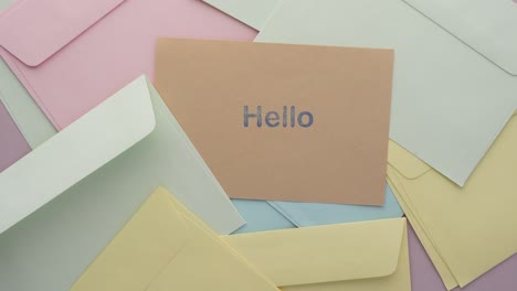 Close-up-of-hello-text-in-blue--on-a-envelope
