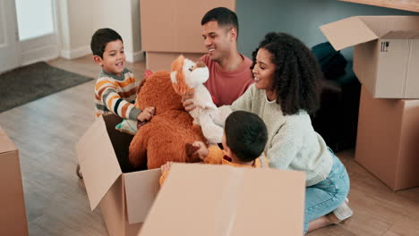Moving,-toys-and-family-with-cardboard-boxes