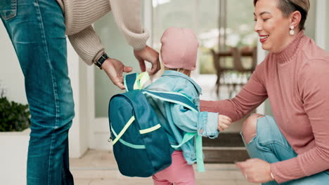 Parents,-child-and-backpack-for-kindergarten