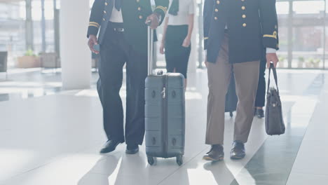 Luggage,-airport-and-pilot-walking-together