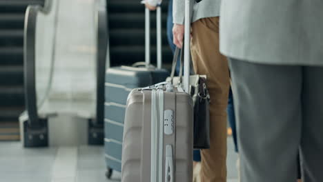 Luggage,-line-and-people-at-an-airport-for-travel