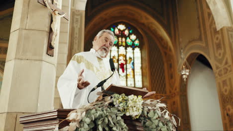 Holy-man,-priest-and-preaching-in-church-on-podium