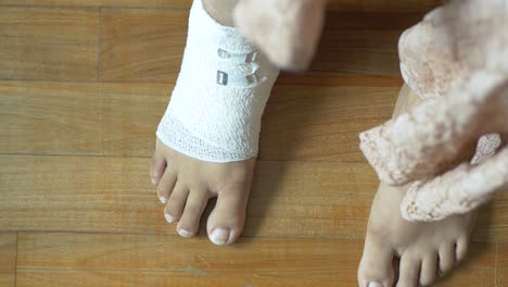 Top-view-of-woman-feet-with-bandaged