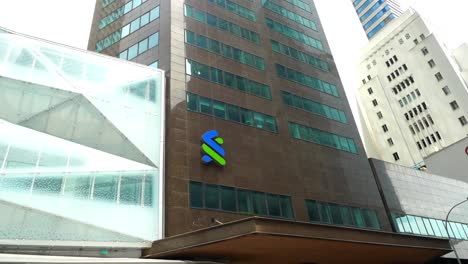 Standard-chartered-bank-logo-on-financial-buildings-in-singapore