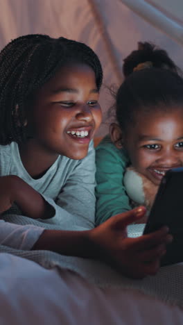 Happy-child,-girl-and-sibling-with-tablet-at-night
