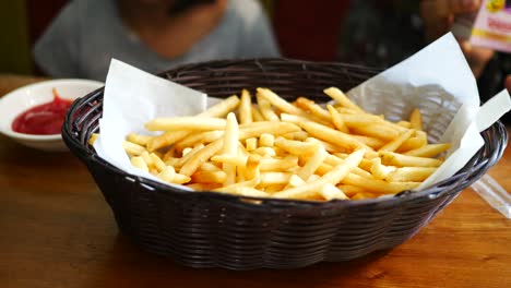 Detail-shot-of-french-fries-on-table