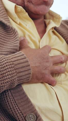 Senior-man,-heartburn-with-hand