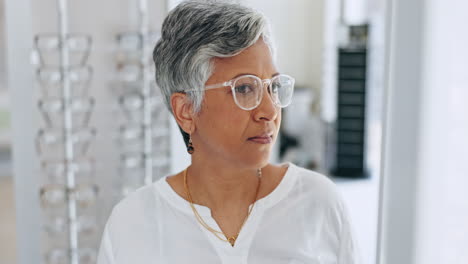 Glasses,-store-and-senior-woman-with-decision