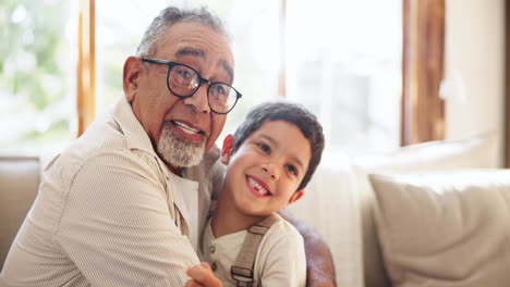 Face,-love-and-grandfather-hug-child-on-sofa