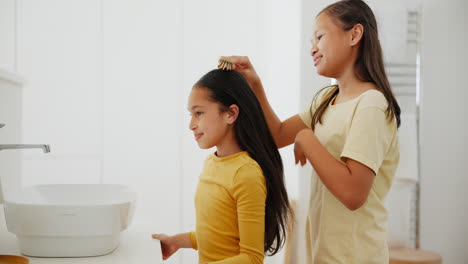 Bathroom,-children-and-brushing-hair-with-girls