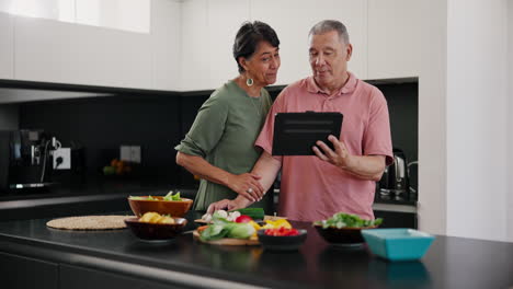 Tablet,-video-call-and-senior-couple-cooking