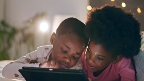 Children,-touch-or-tablet-at-night-for-games