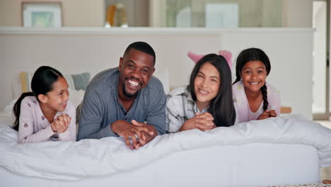 Parents,-girl-children-and-bed-with-face