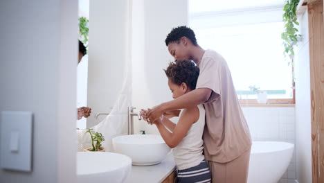 Child,-mother-and-wash-hands-in-bathroom-for-clean