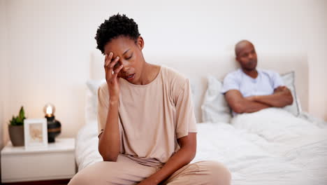 Frustrated,-stress-and-black-couple-in-bedroom