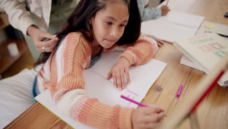 Girl,-writing-and-abacus-with-homework