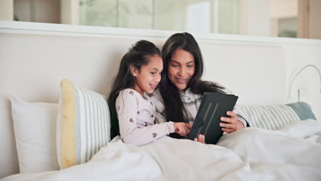 Mom,-kid-and-girl-with-tablet-in-bed-for-online