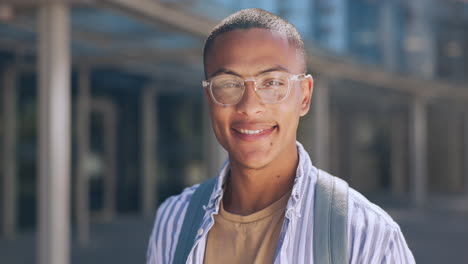 Portrait-of-man-with-smile-outside-campus