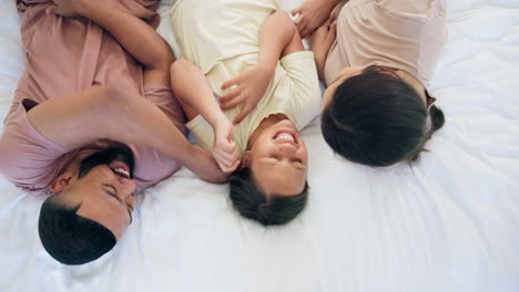 Happy-family,-child-and-tickle-in-bedroom