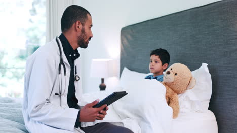 Doctor,-talking-and-tablet-for-child-in-bed