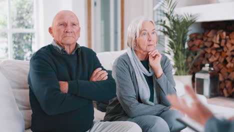 Senior,-couple-and-woman-consultation-on-sofa