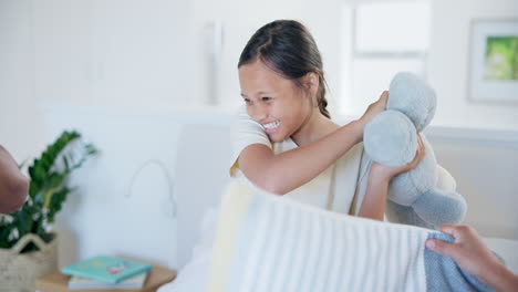 Pillow-fight,-parents-and-happy-girl-child