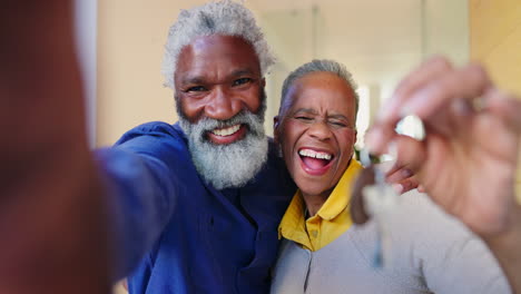 Selfie,-keys-and-senior-couple-with-new-home