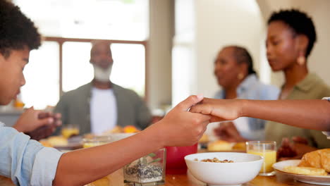 Black-family,-praying-and-food-in-home