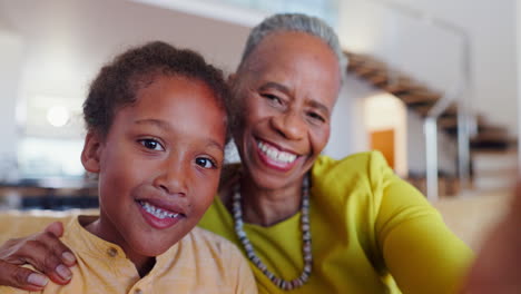 Face,-smile-and-selfie-of-kid-with-grandma