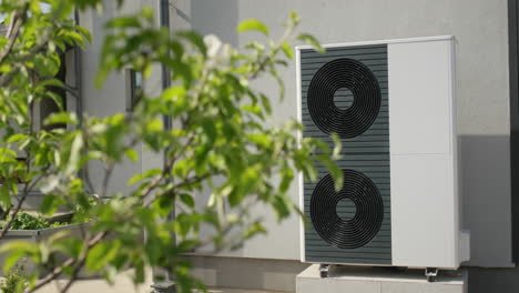 Powerful-heat-pump-for-heating-and-air-conditioning-of-a-modern-private-house.-Energy-saving-technology-concept