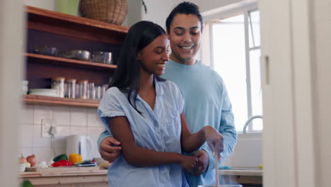 Couple,-smile-and-cooking-in-kitchen