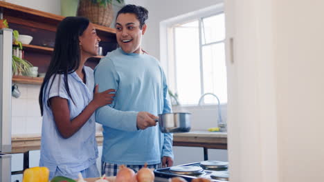 Happy,-cooking-and-couple-in-the-kitchen