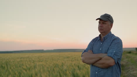Portrait-of-a-middle-aged-farmer-in-front-of-a-wheat-field