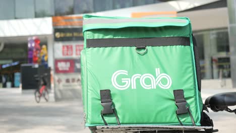 Singapore-1-june-2022-grab-food-logo-on-delivery-bag