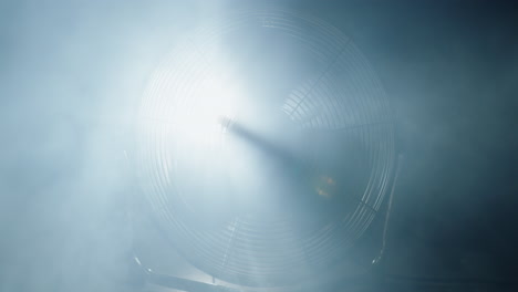 Fan-blades-rotate-in-clouds-of-smoke