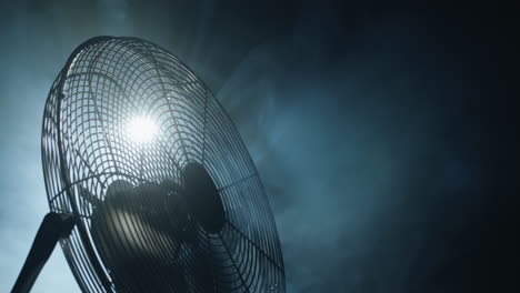 Fan-blades-rotate-in-rays-of-light-and-fog