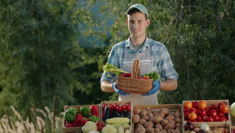 Vendor-holding-a-basket-of-vegetables-at-a-farmer's-market-counter