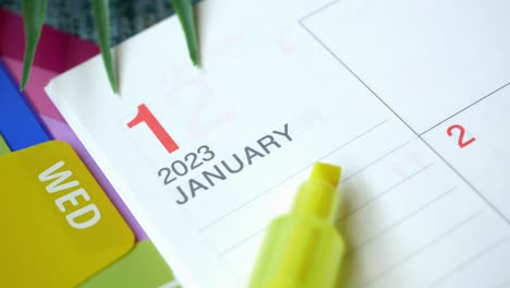 2023-year-calendar-on-office-desk,