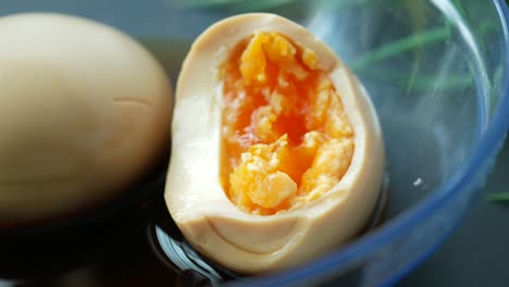 Close-up-of-half-eaten-bowel-egg-in-a-bowl-,