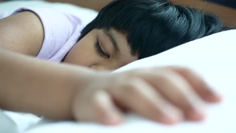 4-year-old-child-girl-sleeping-on-bed
