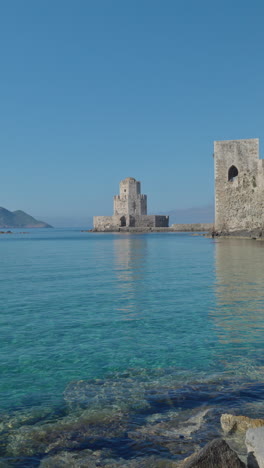 bourtzi-of-methoni-castle-in-greece-with-blue-clear-sea-in-vertical