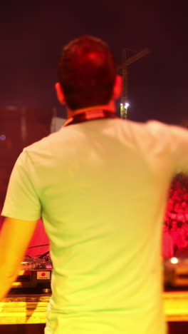 A-view-from-behind-a-dj-at-festival