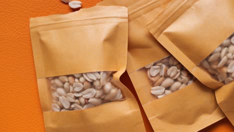 Top-view-of-peanuts-in-a-packet-on-table-,