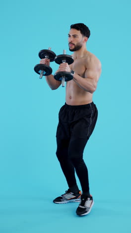 Fitness,-gym-and-man-with-dumbbell-for-training
