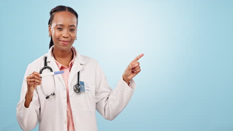 Doctor,-pointing-or-pregnancy-test-with-black