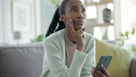 Black-woman,-smartphone-and-thinking-on-couch