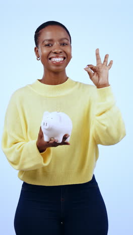 Black-woman,-piggy-bank-and-cash