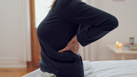 Senior-woman,-hands-and-back-pain-in-home