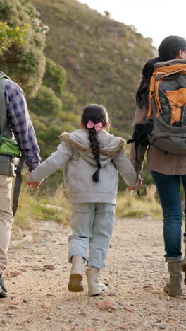 Holding-hands,-fitness-and-family-on-hike