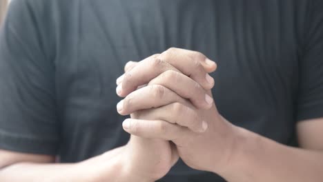 close-up-of-hands-praying-christian